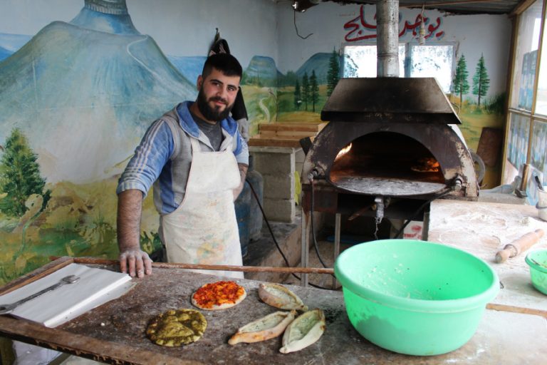 Sampling the delicious food on our Syria tours